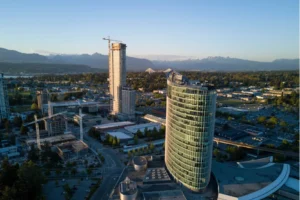 Surrey city skyline with modern high-rise buildings and mountain views